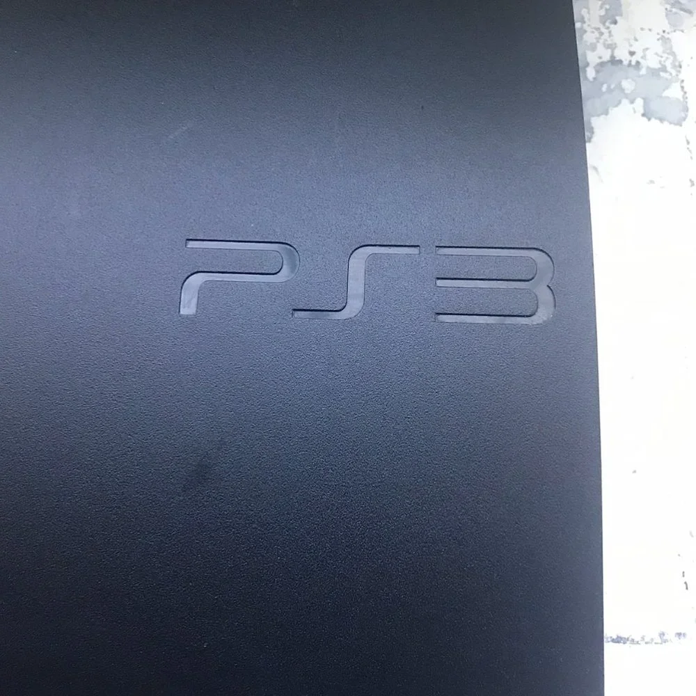 Sony PS3 Slim + GAMES (Truth is no controllers BRuh) sorry